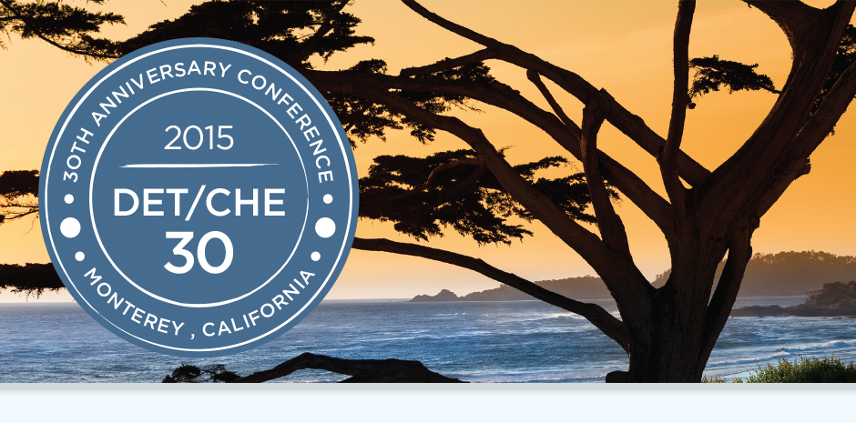 30th anniversary DET-CHE logo on sunset image of tree on coastline